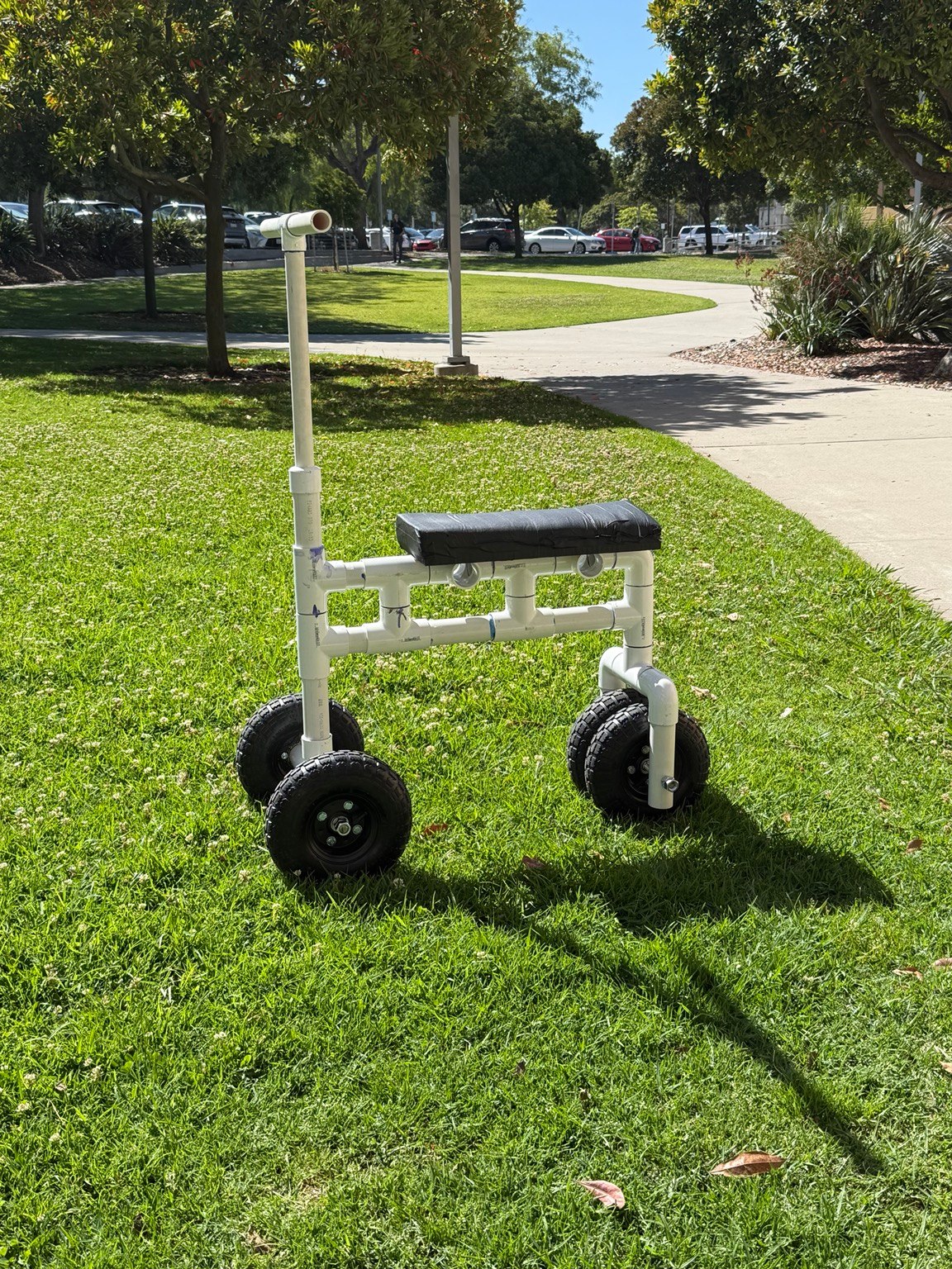 Completed PVC knee scooter standing outdoors